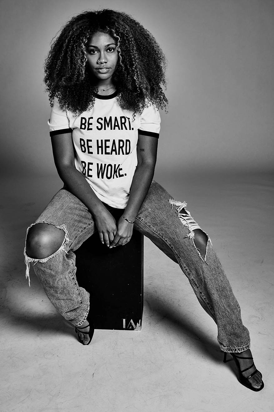 A guest in a "Be Heard. Be Woke." tee at the 2020 shoot for The Truth