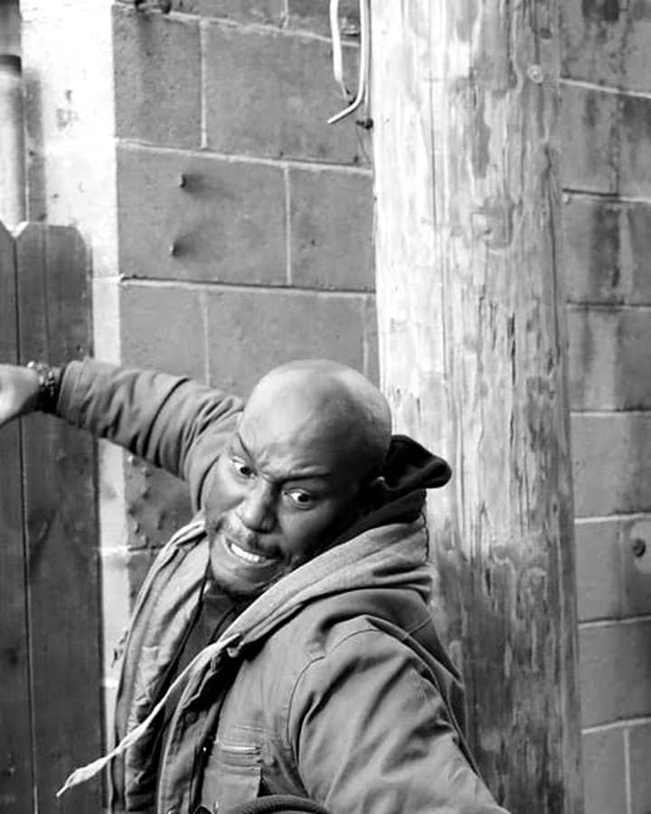 Tyrese Gibson in a still from Black and Blue (2019), in black and white